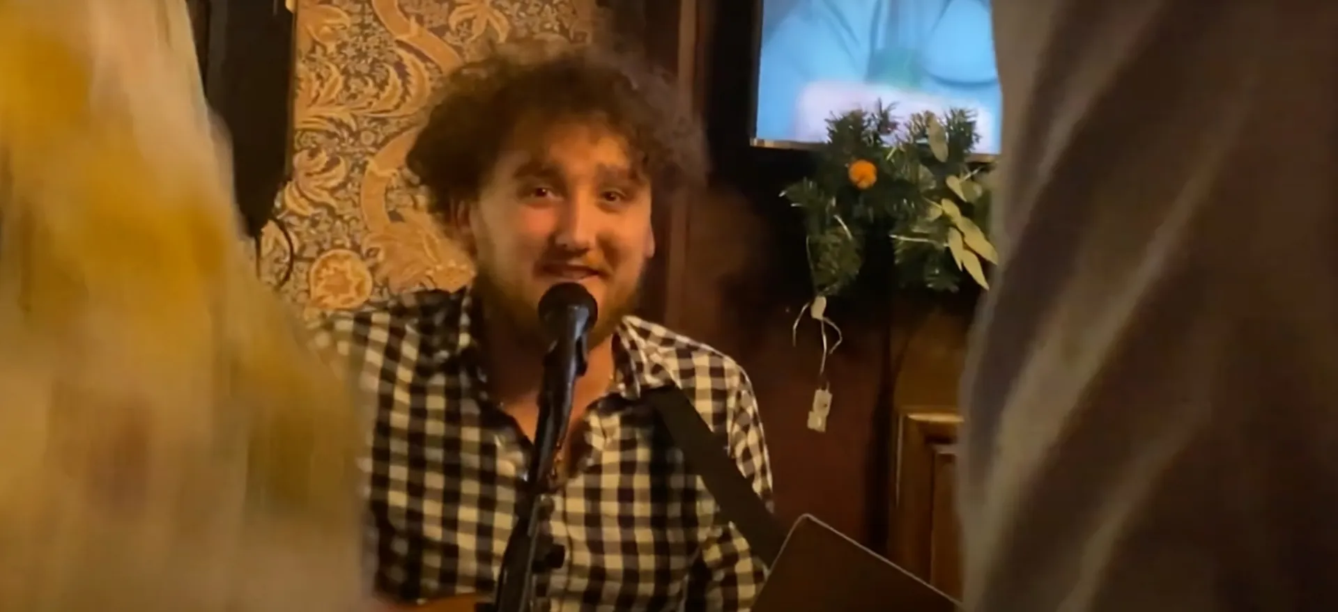 Paddy performing at a venue